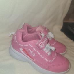 Girls pink fila trainers. Uk size 12 measures 20cm long internally very good condition. See photos for condition and size. I can offer try before you buy option but if viewing on an auction site viewing STRICTLY prior to end of auction.  If you bid and win it's yours. Cash on collection or post at extra cost which is £4.55 Royal Mail 2nd class signed for. I can offer free local delivery within five miles of my postcode which is LS104NF. Listed on five other sites so it may end abruptly. Don't be disappointed. Any questions please ask and I will answer asap.