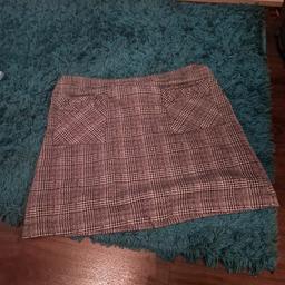 short skirt good condition size 14 nice with tights an boots