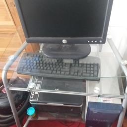 three tier silver and glass computer cabinet ideal for someone with home office space.30 pound no offers collection only no transport. first to see will buy.