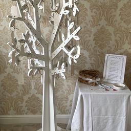 Be different with this unique alternative to guest book.
How fabulous is this 5ft tree with hanging hearts so your guests can add their own personalised message to your wedding tree!
Rhyme verse for guest to read, hearts in basket and pen.

You get 100 hearts with string already attached to them and ready to put tree.
( can have more hearts if required)

Tree can be be placed on the floor or table at your venue.

All heart messages will be put in a personalised keepsake box for you to treasure and look back on of your special day. ( available in gold or silver)

Please note I have lots of items for hire

Large 4ft light up Mr & Mrs and Love letters,
Large hooped wedding cake stand,
Cherry Blossom centrepiece trees,
Sweet cart,
Champagne cart,
5ft wishing tree ,
2 different Vintage post boxes,
Confetti stand and roses trees,
3 different Easels with personalised board or mirror
Donut wall
Shot Wall
Prosecco ladder
Flower walls
Shimmer walls
Balloon hoop or balloon arch.
Discount packages