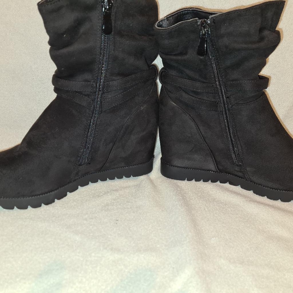 Coco Chanel Ladies Suede Ankle Boots Eu38 Uk 5 Worn Once.  See photos for condition and size. I can offer try before you buy option but if viewing on an auction site viewing STRICTLY prior to end of auction.  If you bid and win it's yours. Cash on collection or post at extra cost which is £5.55 Royal Mail 1st class signed for. I can offer free local delivery within five miles of my postcode which is LS104NF. Listed on five other sites so it may end abruptly. Don't be disappointed. Any questions please ask and I will answer asap.