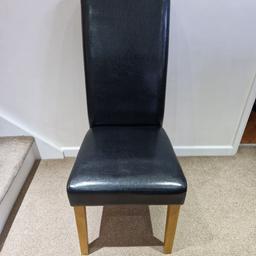 x4 black faux leather dinning chairs with wooden legs. Good condition, can deliver if local.