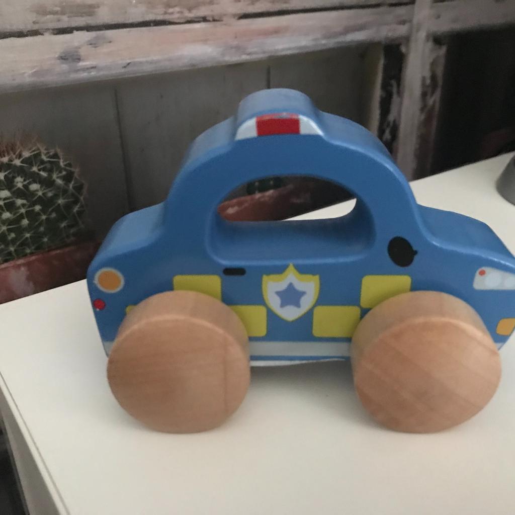 THIS IS FOR A SMALL BUNDLE OF TOYS

1 X LARGE GREY PULL ALONG ELEPHANT
1 X WOODEN POLICE CAR WHICH HAS A CARRY HANDLE FOR SMALL HAND WHERE THE WINDOW WOULD BE
1 X FABRIC SENSORY TOUCH AND SOUND BOOK - A DAY ON THE FARM

PLEASE SEE PHOTO