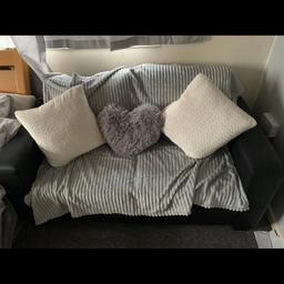 black 2 seater sofa, excellent condition
no rips clean
lightweight
throws and cushions not included