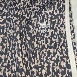 Size 8 Adidas Camouflage Leggings. See photos for condition and size. I can offer try before you buy option but if viewing on an auction site viewing STRICTLY prior to end of auction.  If you bid and win it's yours. Cash on collection or post at extra cost which is £2.65 Royal Mail. I can offer free local delivery within five miles of my postcode which is LS104NF. Listed on five other sites so it may end abruptly. Don't be disappointed. Any questions please ask and I will answer asap.