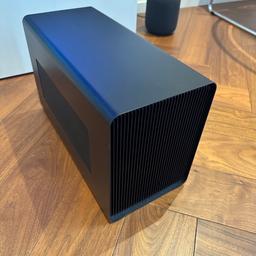 Razer Core X Chroma external GPU enclosure.

Comes with power and usb-c (thunderbolt) cable.