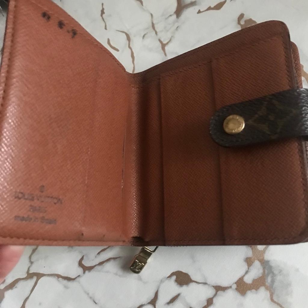 Genuine and Authentic vintage Louis Vuitton unisex wallet/purse. Date stamp CA1918

Open to reasonable offers BUT NO Silly offers!!
NO TIME WASTERS PLZ!!

Although it’s been well used it’s in very good condition for it’s age.

Exterior canvas has no cracking, scratches or imperfections of any sort.

Interior has few minor blemishes due to age. Notes section is peeling however it’s not sticky and does not rub off to notes. Coin section also fine.

No returns or refunds so plz ask any questions

Comes from smoke&pet free home