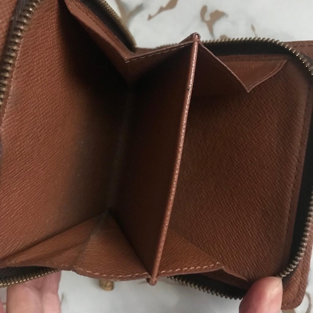 Genuine and Authentic vintage Louis Vuitton unisex wallet/purse. Date stamp CA1918

Open to reasonable offers BUT NO Silly offers!!
NO TIME WASTERS PLZ!!

Although it’s been well used it’s in very good condition for it’s age.

Exterior canvas has no cracking, scratches or imperfections of any sort.

Interior has few minor blemishes due to age. Notes section is peeling however it’s not sticky and does not rub off to notes. Coin section also fine.

No returns or refunds so plz ask any questions

Comes from smoke&pet free home
