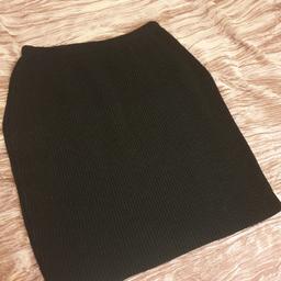 Black knitted skirt with an eladticated waist. Would fit sizes 8-10, very good condition. Perfect for winter.