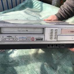 Spares and repairs only. Retro Re diffusion video cassette player. Front loading vhs. Sold as seen. Loft clear out.