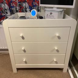 This is a wardrobe and changing station (with draws) 
In very good clean condition. 
The changing station does have marks on the top, we have just placed some wallpaper over it. Changing matt fits inside. 

White/cream colour.