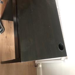 Black desk used, but in good condition