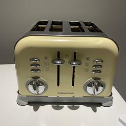 Cream colour Morphy Richards 4 slice toaster, fully working, slight small dent (shown in pictures) but still in good condition.