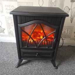 Nice black electric fire just had new bulbs gives how alot of heat and in great condition