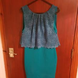 Green dress with lace top overlay  

Topshop  

Size 10  

In good condition only worn once  

From a pet and smoke free household

Collected £3