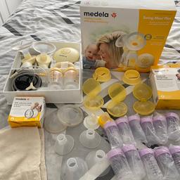 Double breast pump plus extras

Double maxi hub
1x Double tubing
1x single tubing
2x bottles
4x 24mm shield
2x 21mm shield
Boob tube to hold pumps
4 nipple shields with case 2 are near new
X11 sterilised bottles these can be used with the pump
Two teets for purple bottles
Breast milk storage bags
X2 milk collection shells