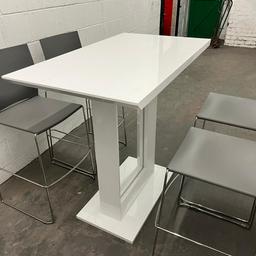 I have for sale this white high gloss bar table and 4 grey plastic seating bar stools with metal frame. This would have retailed for approx £799 when new.
Heavily reduced as it does have a crack in wood underneath table as shown in last picture. it doesn't affect use of the table and is very sturdy.
The stools will stack as shown in picture 3
TABLE MEASUREMENTS L 120CM H 110CM W 70CM
CHAIRS DO NOT FIT RIGHT UNDER THE TABLE DUE TO BOTTOM PLATE SO YOU WOULD NEED A DECENT SIZE SPACE TO FIT.
Viewing available at my unit in Oldham,
Grab yourself an absolute bargain.