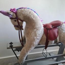 A unique Rocking horse modified to a unicorn, sadly selling as my little girl has now grown up.
A few gems have come off the head strap and a few marks in the grey base otherwise works well.