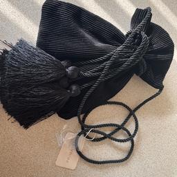 Primark small black bag 
Never been used with tags