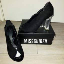Missguided black peeptoe heels with perspex heel
Only worn for a couple of hours Immaculate condition
