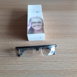VIZMAXX SELF ADJUSTING GLASSES DIAL VISION, WITH INSTRUCTION LEAFLET. BUYER COLLECTS. CASH ONLY. NO PAYPAL. LEIGH ON SEA, ESSEX. SS9IEN. 