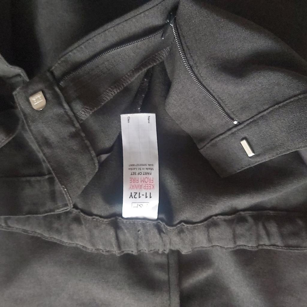 x2 girls grey school trousers from F&F Tesco. front zip and pockets. collection from Romford RM7