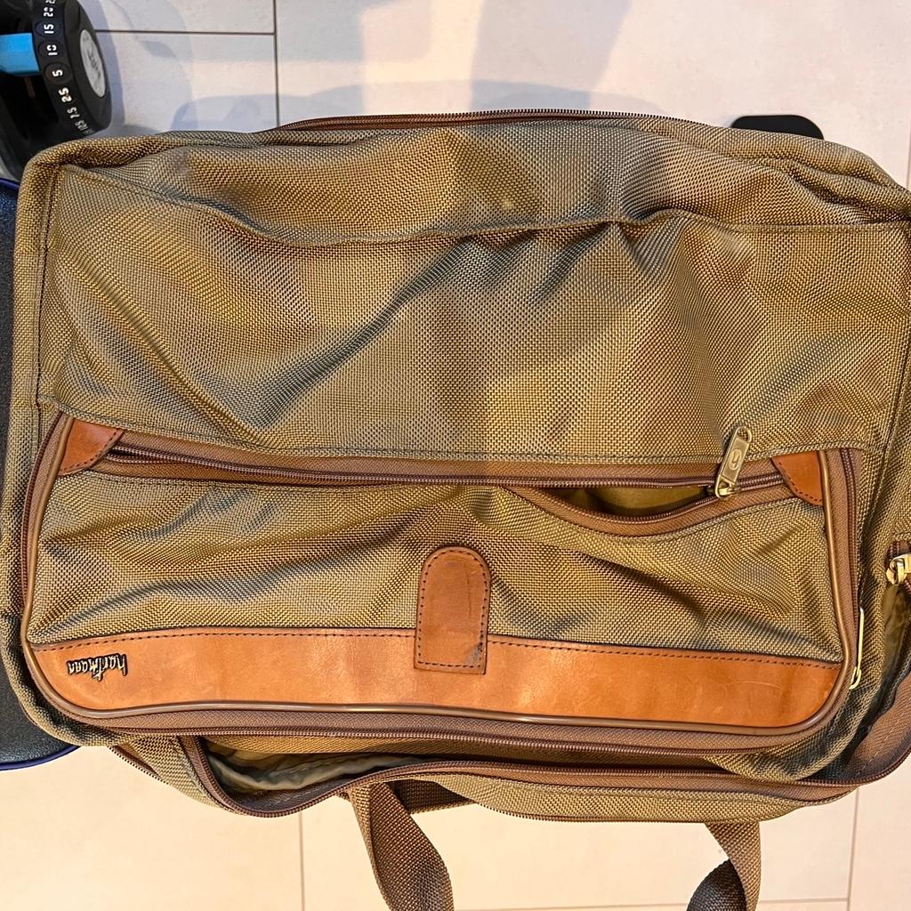Outstanding value Hartmann flexible laptop plus bag. Better than tumi. Hard wearing perfect. Cost £900 yours for £150. Cash upon collection.