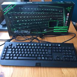 Razer Blackwidow ultimate keyboard, used but in good working condition, there is a scratch on the top of the keyboard that can be seen in photos and doesn’t effect the way it works.
