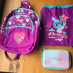 Large used smiggle back pack, swim bag and pencil case. The backpack has my daughters name in but it’s faded so can be covered over and there is a cover missing from one of the zips but still opens properly. See photos.