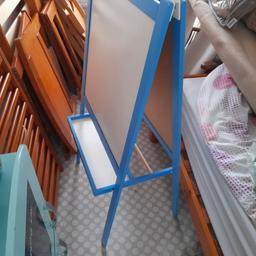 child's easel, collapsible, has whiteboard and chalk board. storage shelf for pens/chalks and also space for roll of paper. can deliver locally for £5.