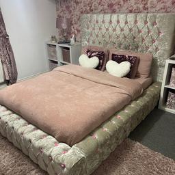 Champagne colour crushed velvet ambassador double
Comes as seen in photos I have glued in pink roses you could replace this with crystals or other colour rose of your chose if desired

One slat is slightly broken but still perfectly usable

Other than that the bed is lovely and only a couple of years old.

Comes with frame and slat only no mattress