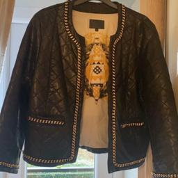 Lovely jacket sized 14 but a bit on small side so I’d say 12/14
Good condition apart from some peeling on neckline as shown on pics.