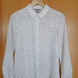 Bluse von H&M mit versteckter Knopfleiste
selten getragen