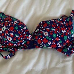 Debenhams blue and red bikini top
Padded
Size 32A
Brand new with tags