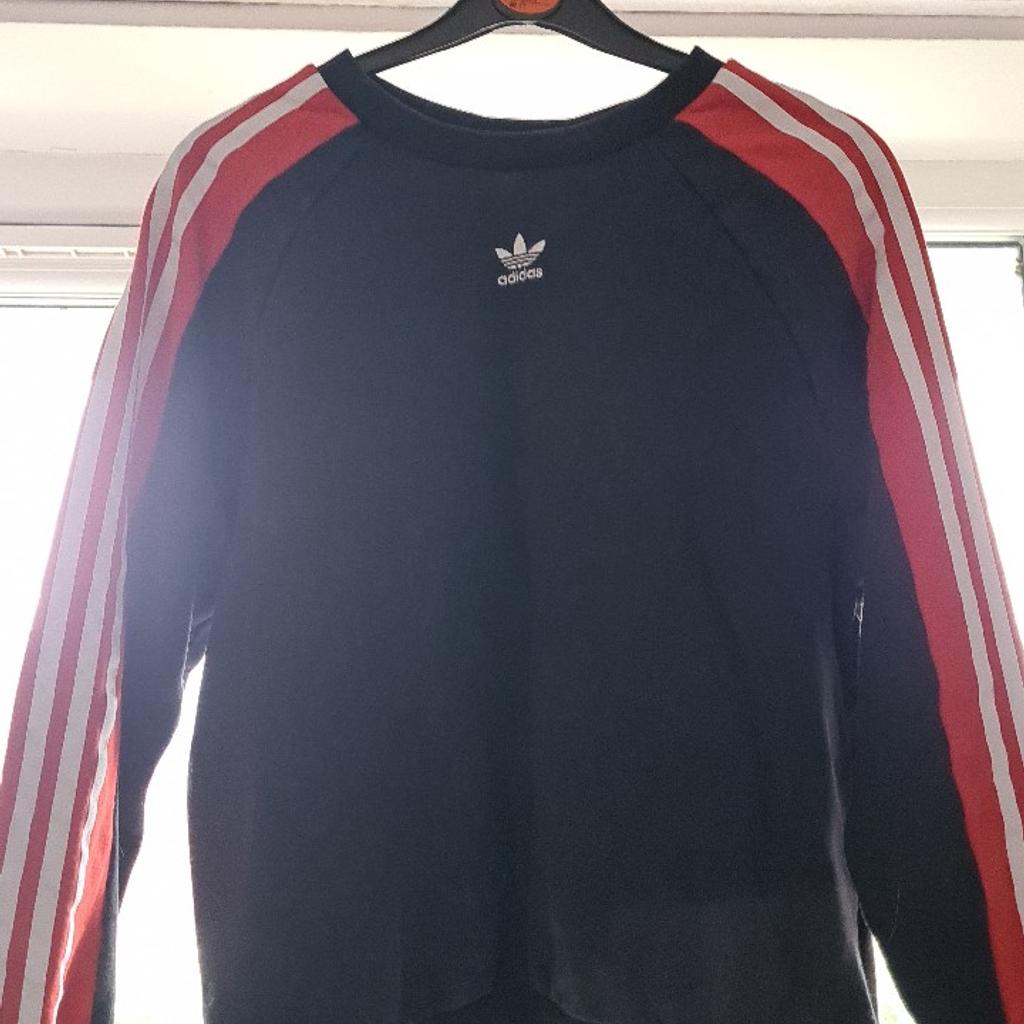 Red and black Adidas jumper
size 8
very good condition