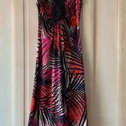 Star by Julian McDonald
Beautiful print and beading
Dress is a lovely material
Size 8