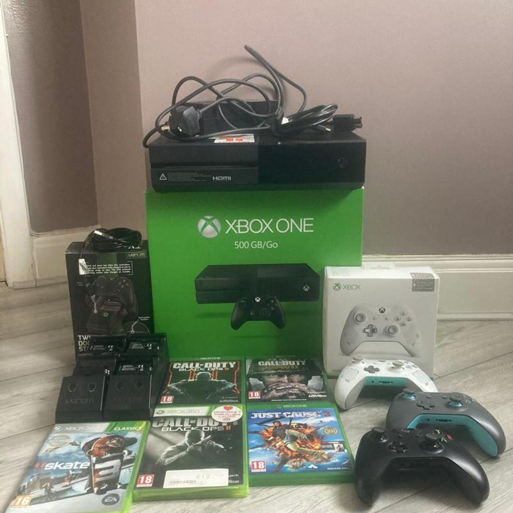 Xbox one console, plus controls, docking stations & games for sale. All relevant cables. Most items still in original boxes. All in good condition. Priced to sell. Collection from sm1
