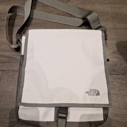 Genuine North Face item. Like new. Unisex shoulder bag. white with grey trim. very nice item. Excellent condition. RRP £65