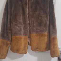 2 toned fur coat in great condition silk from the inside.