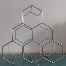 Metal silver Hexagon 6 Bottle Wine Rack, excellent condition.

Used and looks as new.