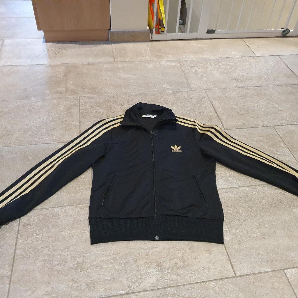 Adidas schwarz 2025 gold jacke