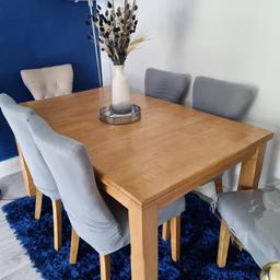 Bought from Oak Furniture Superstore approx 2 years ago for £800.
Few scratches marks/scuffs as pictured
6 elegant beige fabric button chairs included
Extendable

Any further questions feel free to message me.