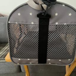 Pet carrier (Or small) grey star fabric & folds flat for easy storage very light weight. Has messed front so your pet can see what’s happening and obviously allows for fresh air in.