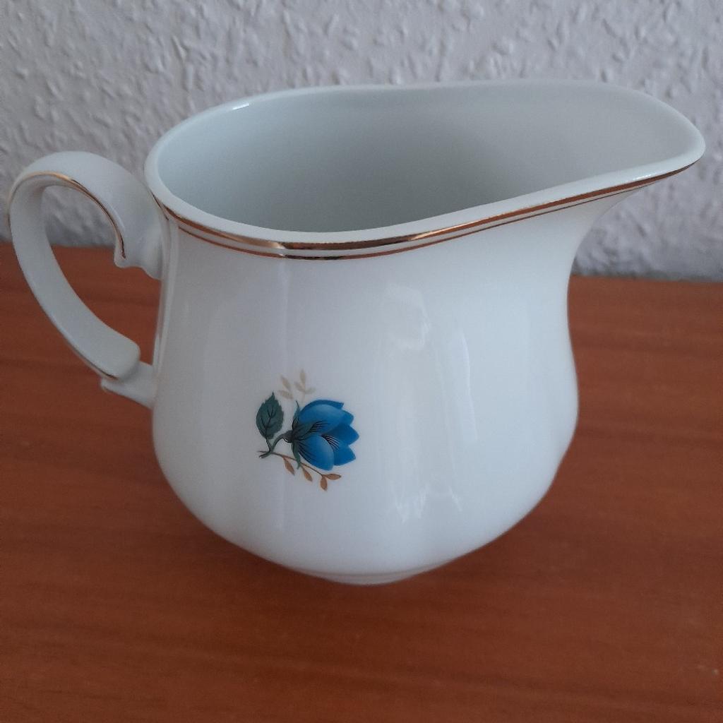 Pretty Vintage Jug Perfect Undamaged Condition. Never used, stored away in mam's cupboard all its life. Can't read maker's mark/stamp. White with gold trim, blue floral design. Size 4.5 in high, 6 in wide including handle. Dates back to 70s era. From smoke and pet free home, check out my other items. Happy to combine postage for multiple purchases or collection from DL5. Thanks for looking.