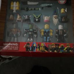 Pack of four Roblox figures and accessories brand new never opened