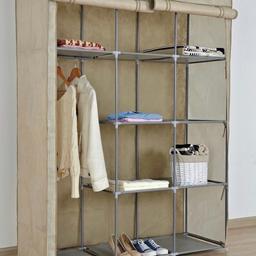 This double modular metal framed
fabric wardrobe features a changeable shelf and storage configuration, allowing you to customise the unit to give you the storage solution you need.
Finished with a modern jute effect
canvas to blend in with contemporary
design.

• Polyester covering with
steel frame.
• Size H169, W132, D46cm.
• Rail weight capacity 43kg.

Only used for a month as a temporary wardrobe, it is still in good condition - flaws shown on Pic4 (one bar is slightly bent, one corner piece is cracked and one fabric piece has a small rip but these don’t affect the use of the wardrobe).
Repackaged back into the box with full instructions.
Takes approx 15-20 mins to build this up and is so easy and holds a lot!!

Originally bought for £55.00 new and is still in the current Argos catalogue.

Collection from Liverpool L25 ONLY.