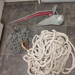 simpson Lawrence delta high holding power fast set self launch anchor like new with chains and rope.