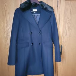 warehouse size 10 navy coat wore once for an occasion never wore since as new.
rrp£85