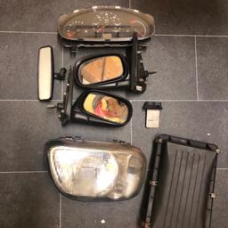 Nissan Micra k11 assorted parts mirrors wing/rear view air headlight

Hi I have this assortment of micra k11 parts for sale from my old project car.

Parts from micra K11 1998

- [ ] Wing mirrors both sides unpainted.

- [ ] Rear view mirror.

- [ ] Speedo with cracked seen but very easy to change.

- [ ] Heater speed resistor (not sure if this one functions) can’t remember and have no way of checking.

- [ ] Original air box.

- [ ] Drivers side headlight FACELIFT K11 WITHOUT ORANGE INSERT.

I won’t separate items I want them all collected together.

OFFERS WELCOME