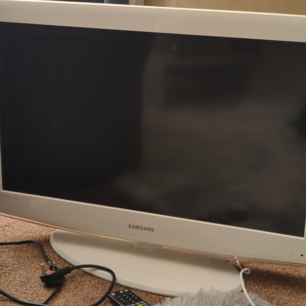 Fully working television, with replacement remote control, sold as seen.